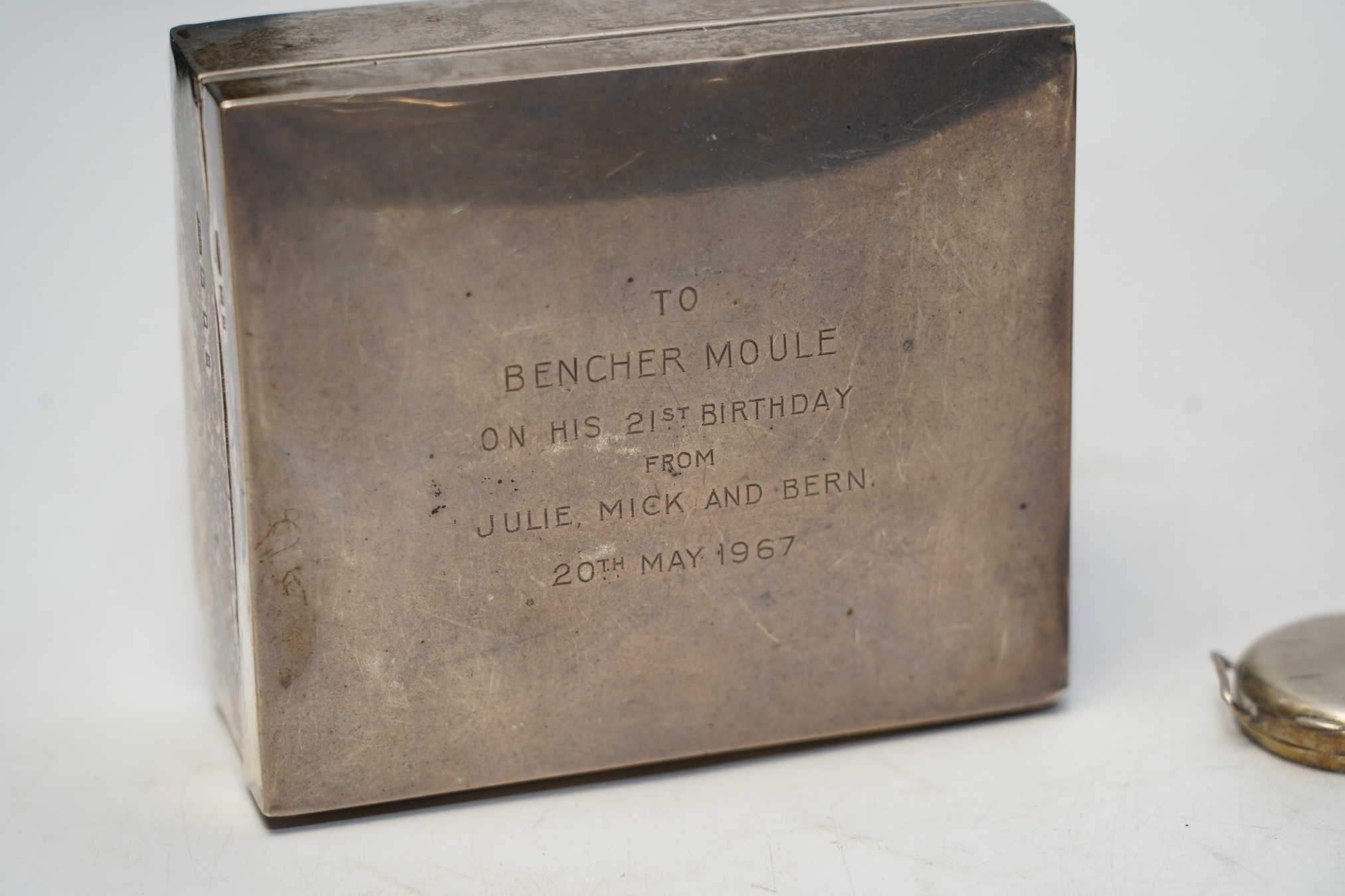 Two early 20th century silver mounted square cigarette boxes, largest 10.1cm, a similar silver cigarette case and three other silver items. Condition - fair to poor